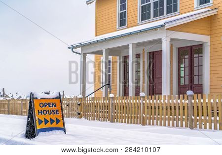 Property For Sale With An Open House Sign In Utah