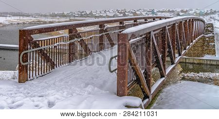 Winter In Daybreak With Bridge Overlooking Homes