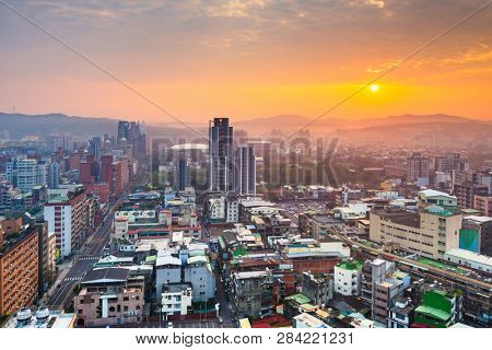 Hsinchu, Taiwan downtown city skyline from above at dawn.