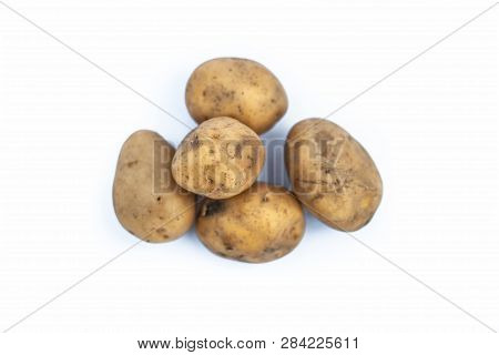 Close Up Of Raw Organic Potato Or Solanum Tuberosumor Aaloo Or Alu Isolated On White.