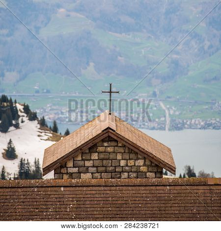Cross On Roof At Mount. Rigi - Arth, Switzerland