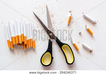 Whole And Scissored Cigarettes. Concept Stop Smoking
