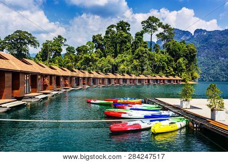 Floating Bungalows With Kayaks At Khao Sok National Park, Cheow Lan Lake, Surat Thani, Thailand