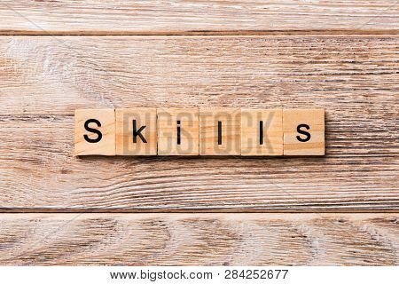 Skills Word Written On Wood Block. Skills Text On Wooden Table For Your Desing, Concept