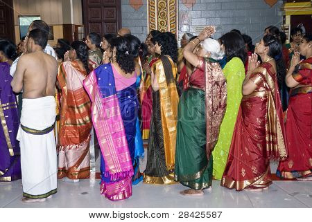 Hindu Devotees Pray During The Chariot Festival At Richmomd Hill Temple