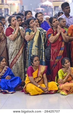 Hindu Devotees Gather And Pray During The Chariot Festival At Richmomd Hill Temple