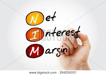Nim - Net Interest Margin Acronym With Marker, Business Concept Background