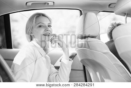 Business Life Concept. Business Woman Sit On Backseat. Busy Lady Passenger Leather Car Salon Enjoy J