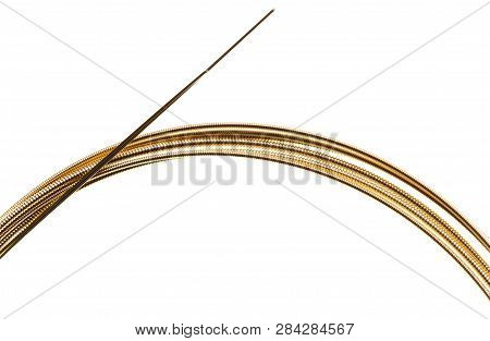 Strings For Guitar Isolated On A White Background. Macro