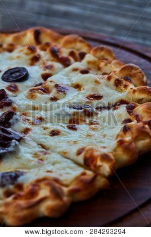 Lebanese style flatbread with cheese and olives