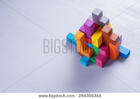 Abstract Construction From Wooden Blocks Shapes With Copy Space. The Concept Of Logical Thinking, Ge