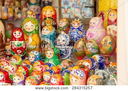 MOSCOW, RUSSIA - FEBRUARY 13,2019: Large selection of matryoshkas Russian souvenirs at the gift shop. Nesting dolls are the most popular souvenirs from Russia