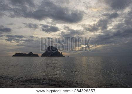 The Island Of Es Vedra Of Ibiza At Sunset