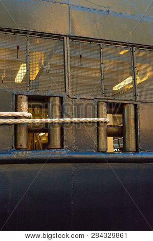 Rope Mooring Lines, Fairleads Near Stern Port Side Of Berthed Cruise Ship.