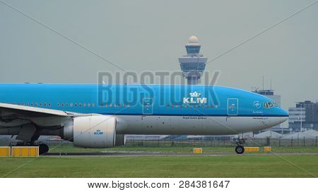 Amsterdam, Netherlands - July 27, 2017: Side View Of Boeing 777-206(er) Of Klm Airlines Is Taxiing O