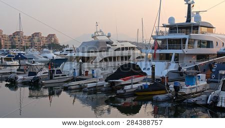 Tuen Mun, Hong Kong 01 February 2019:- Typhoon shelter in Gold coast at Hong Kong under sunset