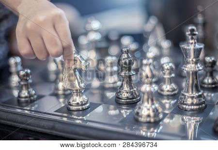 Hand Move Silver Hourse Model On Board Strategic Game