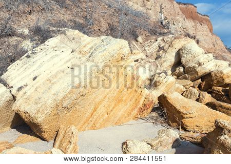 Rockslide. Mountain Landslide In An Environmentally Hazardous Area. Large Cracks In Earth, Descent O