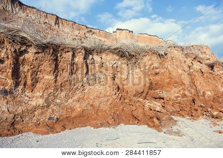 Rockslide. Mountain Landslide In An Environmentally Hazardous Area. Large Cracks In Earth, Descent O