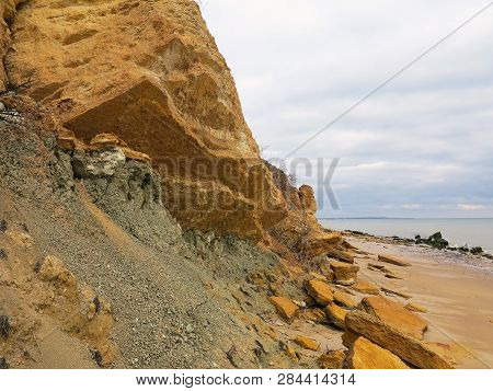 Rockslide. Mountain Landslide In An Environmentally Hazardous Area. Large Cracks In Earth, Descent O