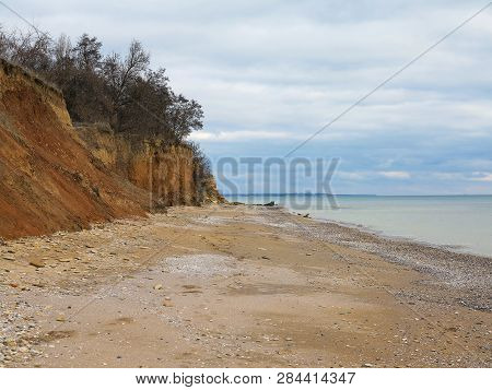 Rockslide. Mountain Landslide In An Environmentally Hazardous Area. Large Cracks In Earth, Descent O