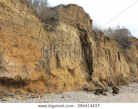 Rockslide. Mountain Landslide In An Environmentally Hazardous Area. Large Cracks In Earth, Descent O