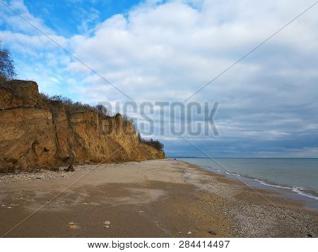 Rockslide. Mountain Landslide In An Environmentally Hazardous Area. Large Cracks In Earth, Descent O