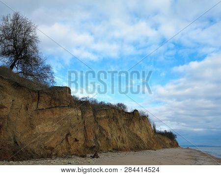 Rockslide. Mountain Landslide In An Environmentally Hazardous Area. Large Cracks In Earth, Descent O