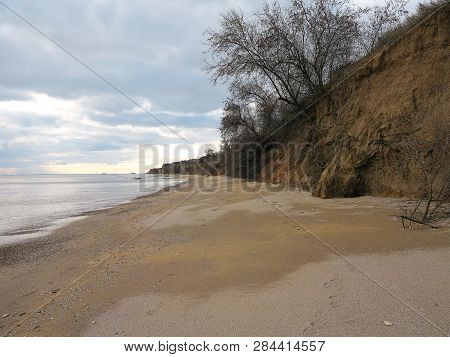 Rockslide. Mountain Landslide In An Environmentally Hazardous Area. Large Cracks In Earth, Descent O