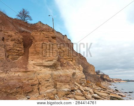 Rockslide. Mountain Landslide In An Environmentally Hazardous Area. Large Cracks In Earth, Descent O