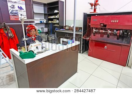 Inside Interior Of A  Dry Cleaners In A Mall