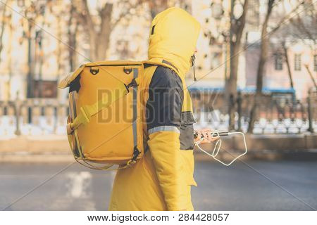 Courier Delievery Guy With Huge Backpack On Foot