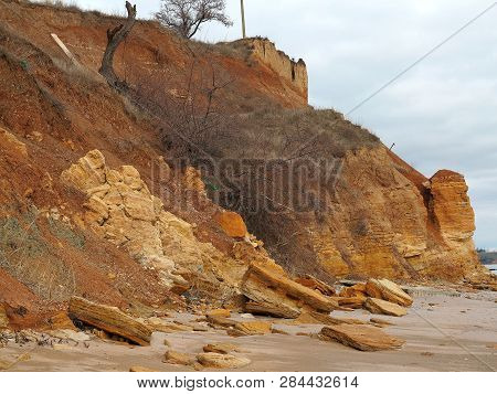 Rockslide. Mountain Landslide In An Environmentally Hazardous Area. Large Cracks In Earth, Descent O