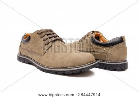 Brown suade shoes isolated on white background
