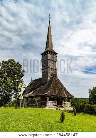 Maramures, Romania - August 1st, 2018: A Typical Example Of The Famous Wooden Churches Of The Maramu