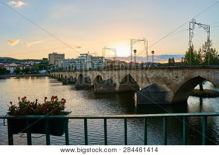 Mirandela, Portugal - July 20, 2014 : View Of The Pedestrian Bridge Over The Tua River In Mirandela,