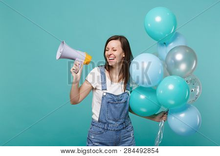 Laughing Young Girl In Denim Clothes With Closed Eyes Hold Megaphone Celebrating With Colorful Air B