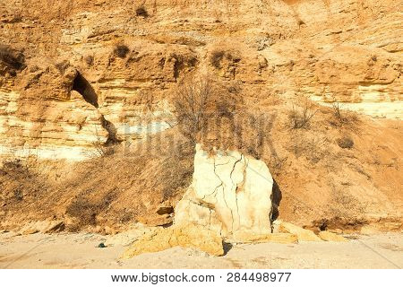 Rockslide. Mountain Landslide In An Environmentally Hazardous Area. Large Cracks In Earth, Descent O