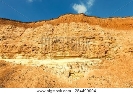 Rockslide. Mountain Landslide In An Environmentally Hazardous Area. Large Cracks In Earth, Descent O