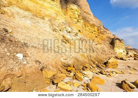 Rockslide. Mountain Landslide In An Environmentally Hazardous Area. Large Cracks In Earth, Descent O