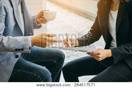 Two Businessman Investment Consultant Analyzing Company Financial Report Balance Sheet Statement Wor