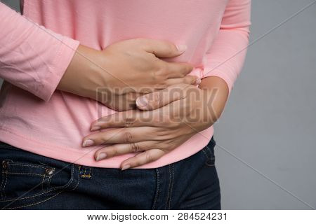 Young Woman Having Painful Stomachache. Chronic Gastritis. Abdomen Bloating And Healthcare Concept.