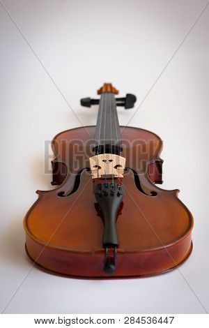 Violin Or Viola With Bow In White Background. Fiddle In White Background