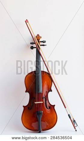 Violin Or Viola With Bow In White Background. Fiddle In White Background