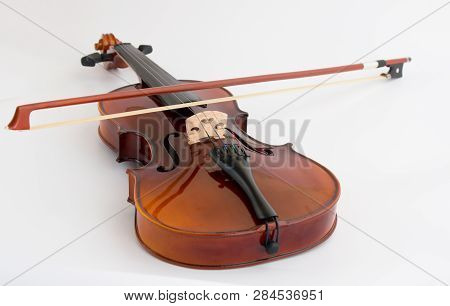 Violin with bow in white background or fiddle in white background