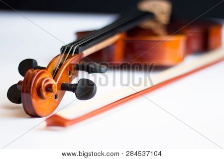 Violin Or Viola With Bow In White Background. Fiddle In White Background