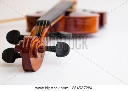 Violin with bow in white background or fiddle in white background