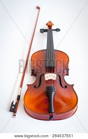 Violin with bow in white background or fiddle in white background