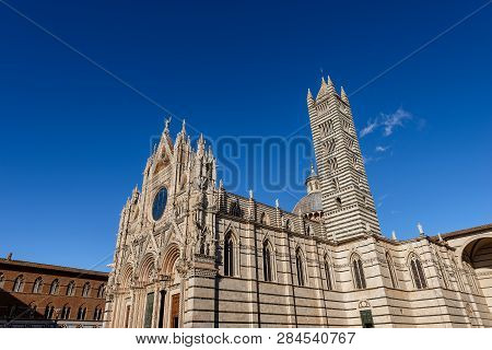 Siena Cathedral, Santa Maria Assunta 1220-1370 With Clear Blue Sky. Tuscany, Italy, Europe