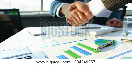 Businessman In Sut Hand Shake In Ofiice Closeup. Introduce Manager Job Man Risk Chart Paper How Deal